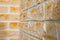 Close up view of corner of wall made of hand made gypsum plaster bricks.