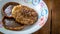 Close up view of Cucur Jawa or Cucur Topi, a traditional Malay food in a white plate