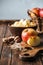 close up view of cut and wholesome apples on cutting board on dark