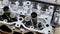 close up view of disassembled sixteen-valve four-cylinder engine. day at car service, engine overhaul, close view of