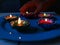 A close-up view of diyas/lamps placed on a plate to celebrate diwali