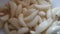 Close-up view of dry peeled garlic clove background