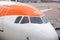 Close up view of Easyjet Airbus A319-111 aircraft cockpit at Manchester airport terminal