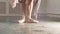 Close up view of elegant ballerina standing on toes in pointes