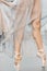 Close up view of elegant ballerina standing on toes in pointes