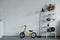 close up view of empty childish room with balance bike