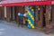 Close-up view of entrance to restaurant decorated with yellow blue balloons and welcoming board in honor of Swedish National Day