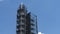 Close-up view of factory on oil refining. Petrochemical industrial plant on the classic blue sky background. Space for text.