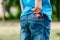 Close up view of fidget spinner in the back pocket jeans outdoors