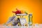 close-up view of fresh fruits and vegetables on scales, sports bottle with water, sneakers and measuring tape