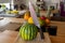 Close-up view of fresh water melon and a damascus kitchen knife standing on a cooking island