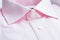 Close up view of a generic pink business shirt.