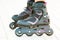 Close-up view of girl\'s legs in roller blades