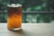 Close up view of a glass of orange espresso