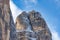 Close up view of gorgeous rocky mountains partly covered with snow in Dolomites
