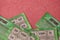 Close up view of green lottery scratch cards. Many used fake instant lottery tickets with gambling results. Gambling addiction