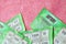 Close up view of green lottery scratch cards. Many used fake instant lottery tickets with gambling results. Gambling addiction
