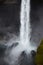 Close up view of Haifoss waterfall crashing against rocks