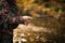 Close-up view of the hands of a fly fisherman working the line and the fishing rod