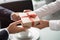 Close up view of hands Giving a business gift in an office