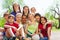 Close-up view of happy teenagers sitting close