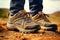 Close up view of hikers sturdy hiking shoes while actively walking in the great outdoors