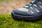 Close Up View of Hiking Boots on Moss Covered Forest Floor