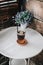 Close up view of iced coffee with orange - A glass of espresso shot mixed with orange juice and craft soda on white table