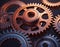 A close-up view of interlocking rusty metal gears on a dark background, symbolizing complex