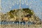 A close up view of the Isole dei Ciclopi at Aci Trezza, Sicily viewed through a light matrix