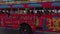 Close up view of joyful faces of people riding in tourist bus on road in center of Oranjestad on island of Aruba.