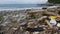 Close-up view of a landfill on the Black Sea, Crimea. Ecological tragedy of land clogging. A dirty ocean shore clogged