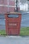 A close up view of a litter or rubbish bin