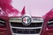 Close-up view of logo on hood car Alfa Romeo