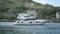 Close Up View Of Luxury Yacht Half Sunken After Storm In The Mediterranean Sea, France, Europe. Footage. White boat slow
