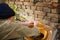 Close up view of man squating to wash hands.