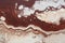 A close-up view of marble ink art that resembles the texture of coffee, capturing the essence of espresso, top view