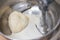 Close up view of mixer in Bakery, mixing dough for pastry.