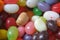 Close up view of multicolored egg shaped candies