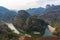 Close up view of Nine-bend river and bamboo rafts from mountain top in Wuyi mountains, China