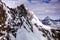 Close up view of the north face of the Breithorn near Zermatt with the Matterhorn in the background