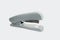 Close-up view of office stapler over white background