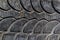 Close-up view of old black weathered tyre background