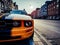 Close up view on an orange and black mustang