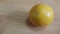 Close up view of oranges on wooden floor with wooden background