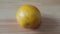 Close up view of oranges on wooden floor with wooden background