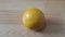 Close up view of oranges on wooden floor with wooden background