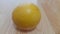 Close up view of oranges on wooden floor with wooden background