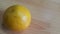 Close up view of oranges on wooden floor with wooden background