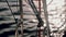 Close-up view of the parts of the ship, cables and carbines. The lifebuoy hangs on the yacht.